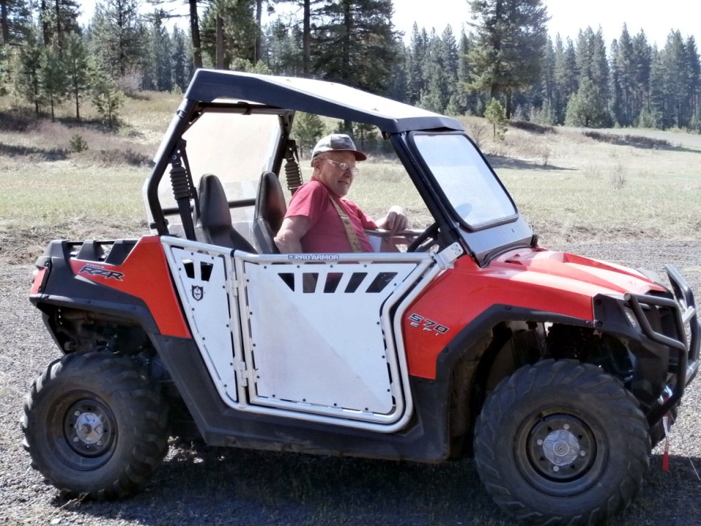 old man in side-by-side