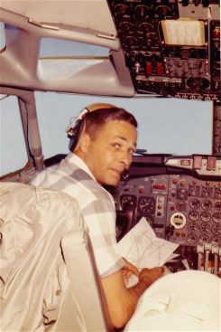 Test pilot Lew Wallick in 707 cockpit, 1959.